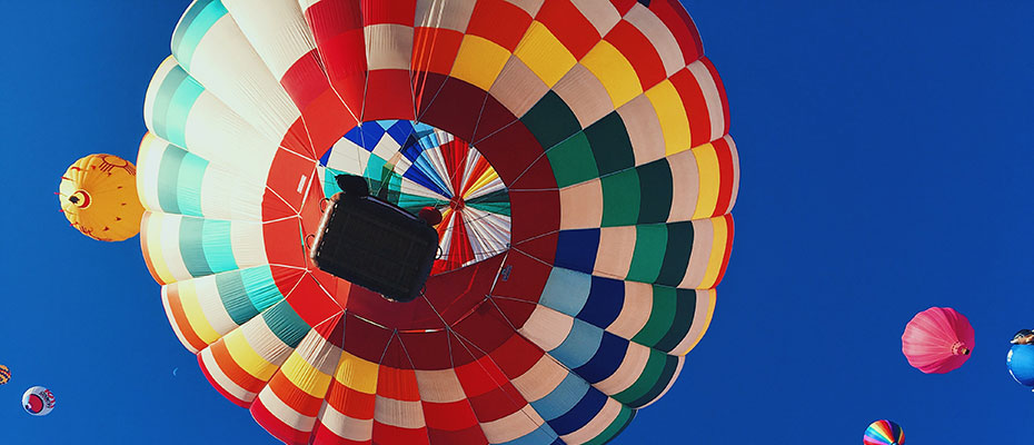 Hot air balloons on a blue sky.