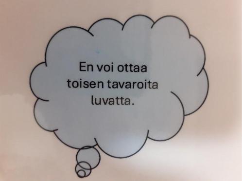Ajatuskuplassa on teksti: "En voi ottaa toisen tavaroita luvatta."